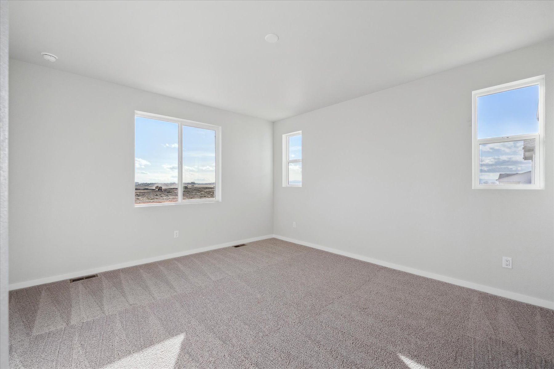 A room with a few windows.