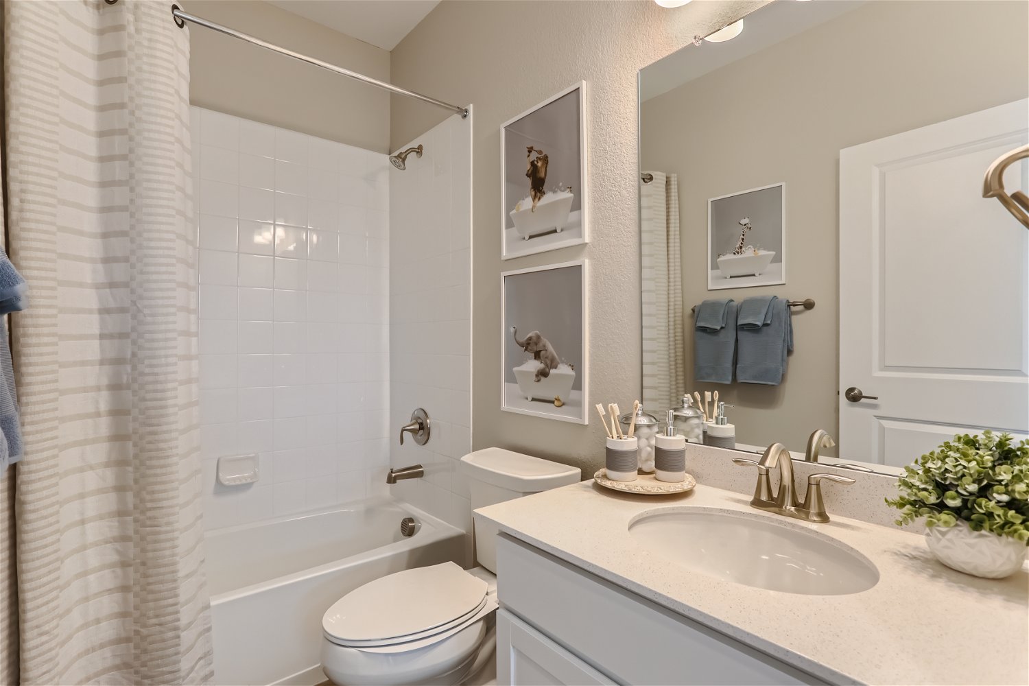 A bathroom with a sink and a bathtub.