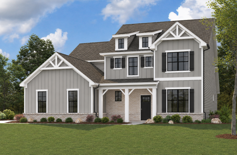 A house with a lawn in front.