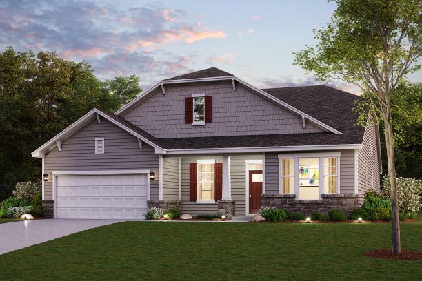 A house with a lawn in front of it.