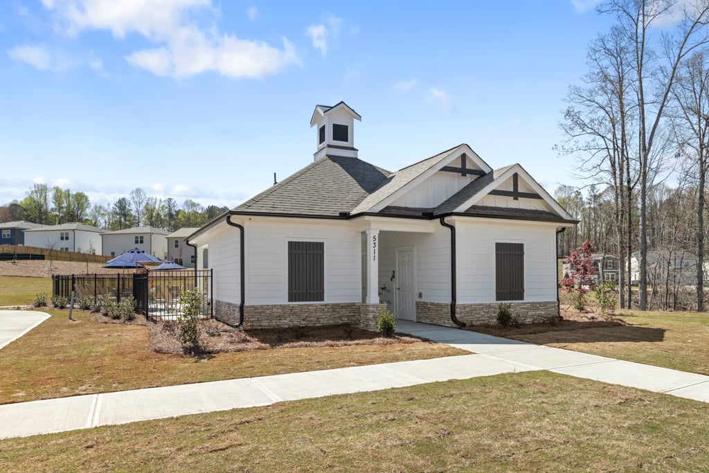 A house with a fence around it.