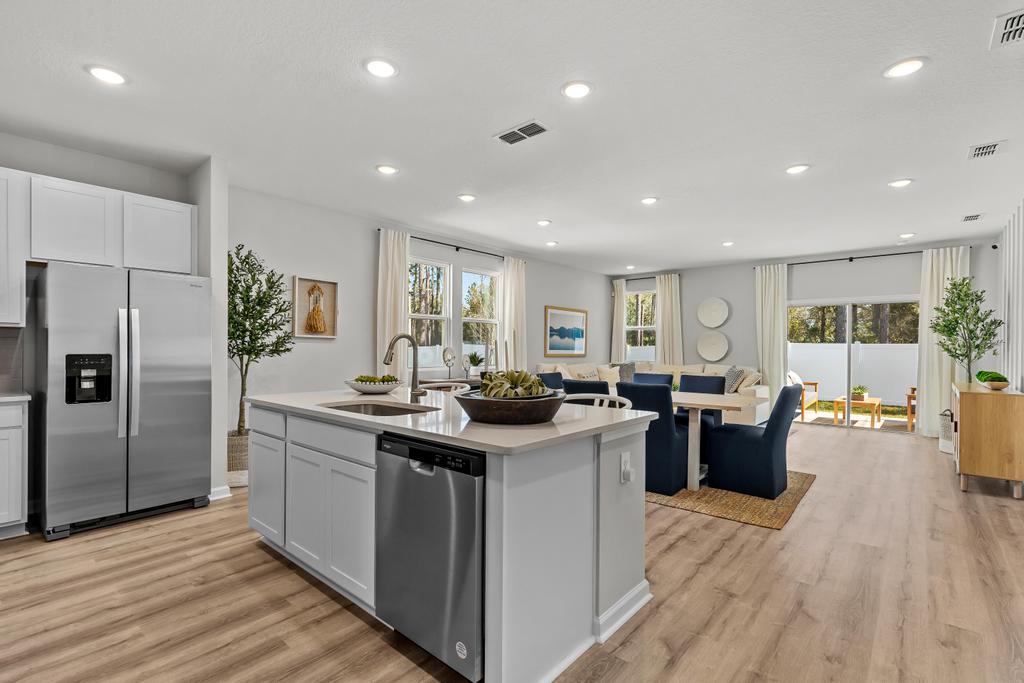 A kitchen with a large island.