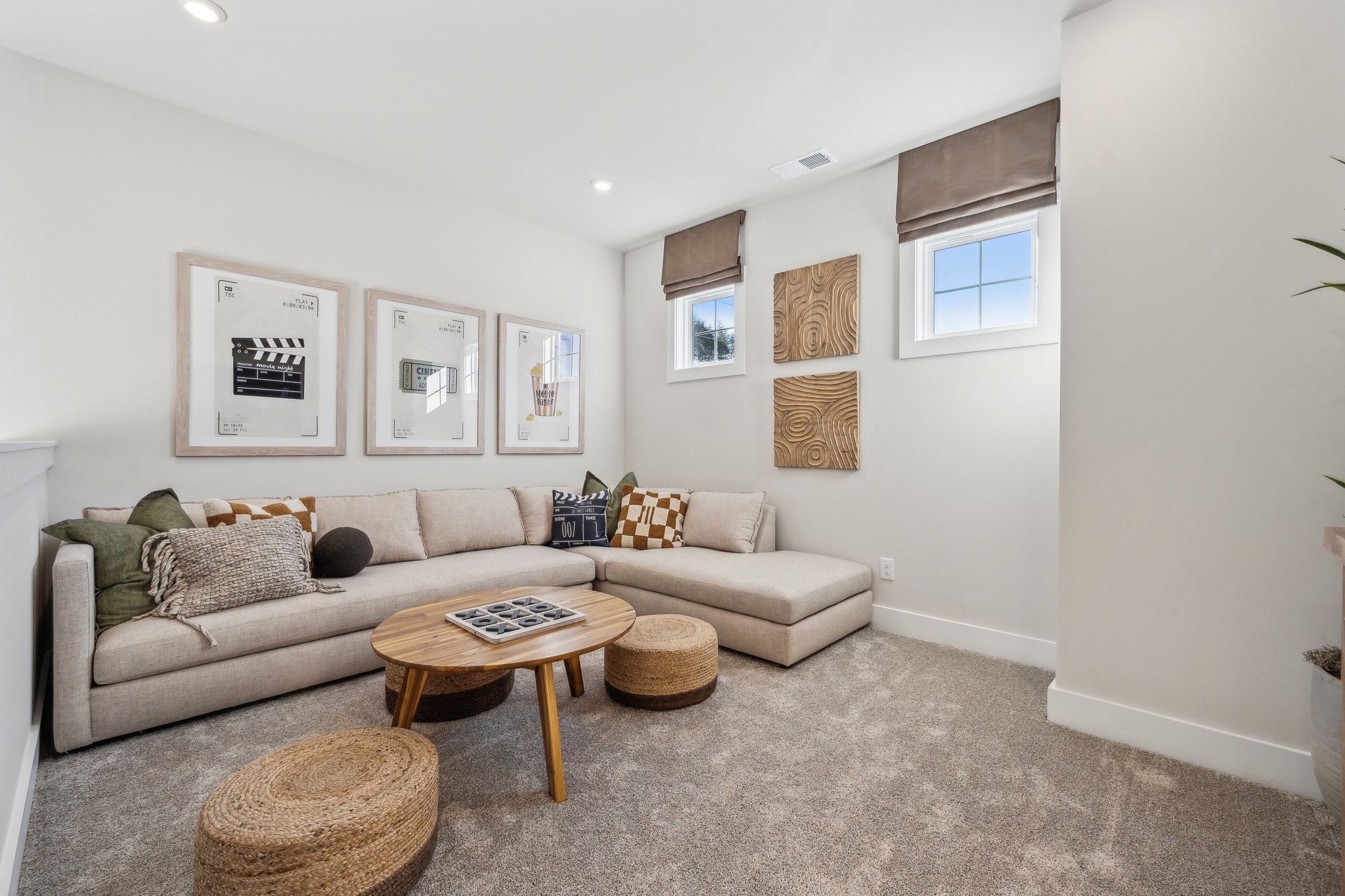 A living room with a couch and a coffee table.