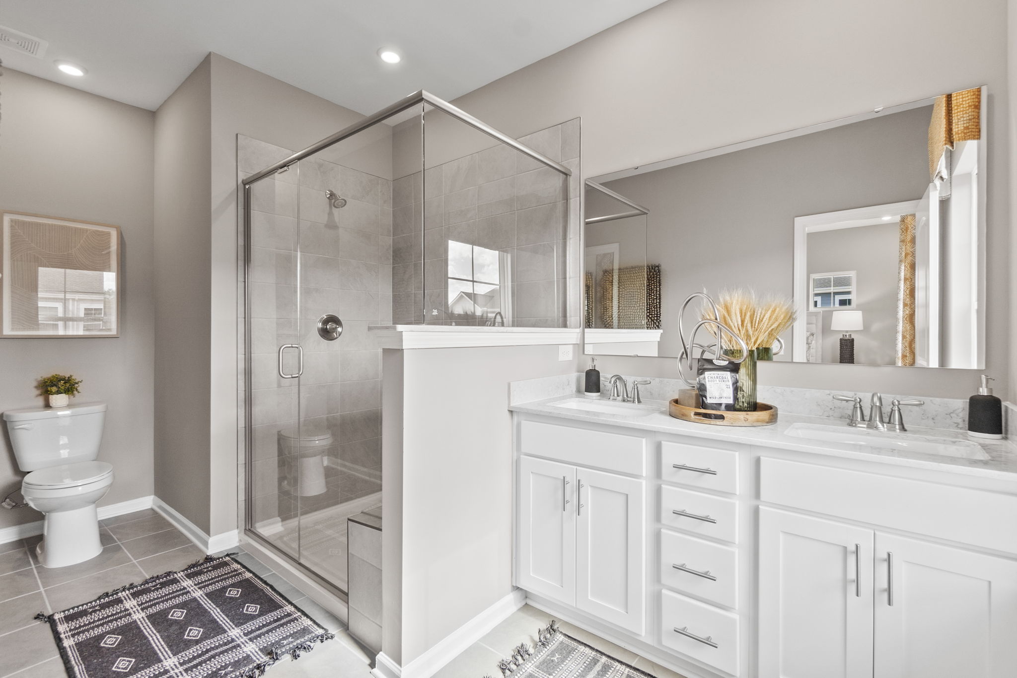 A bathroom with a glass shower.