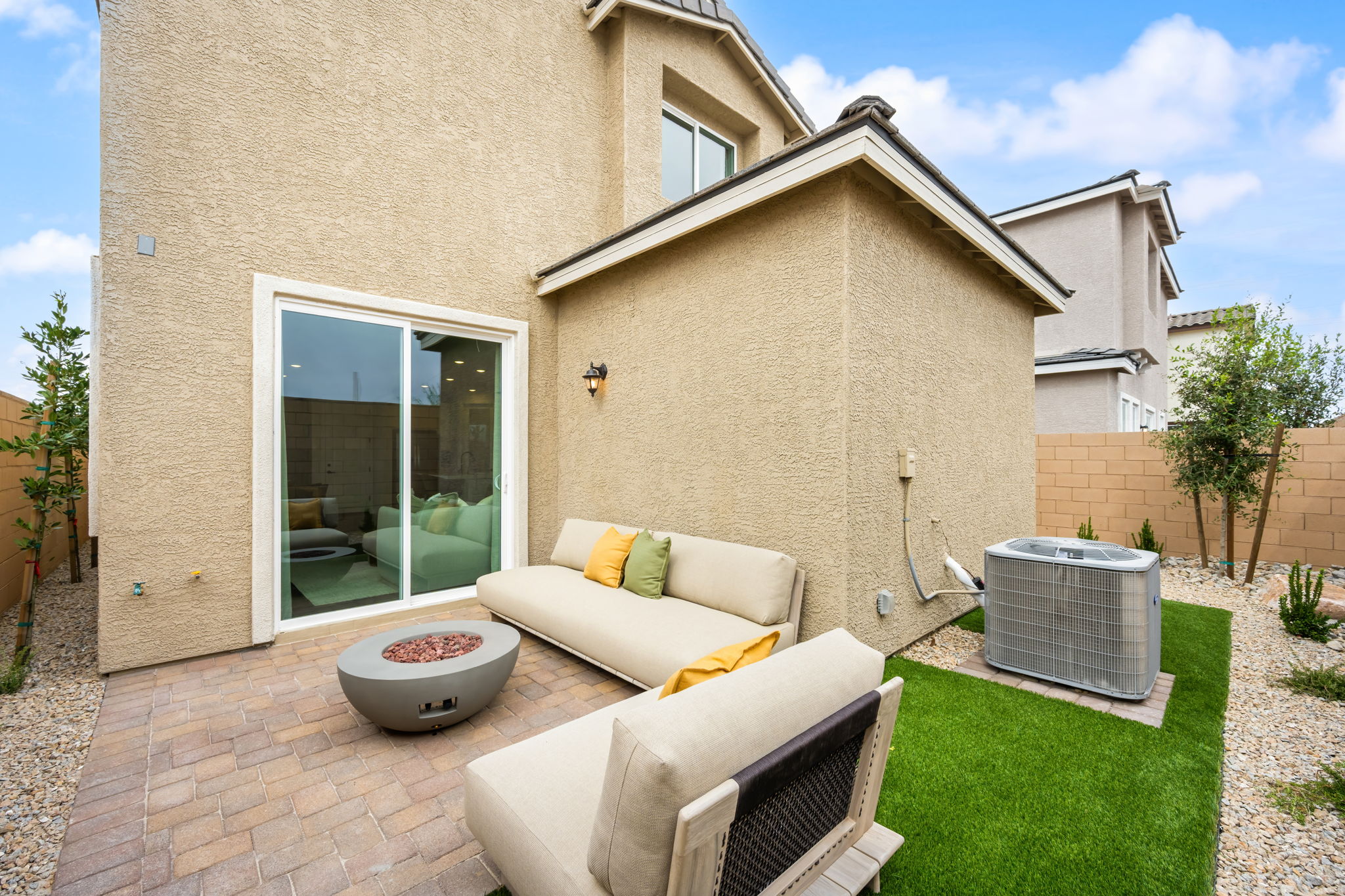 A house with a patio and a brick patio.