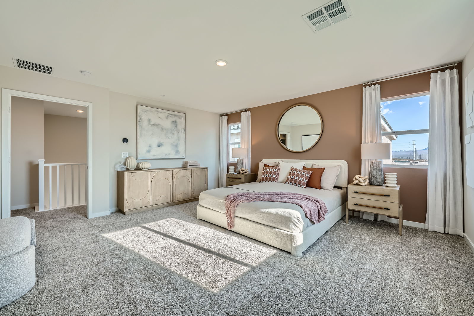 A bedroom with a large bed.