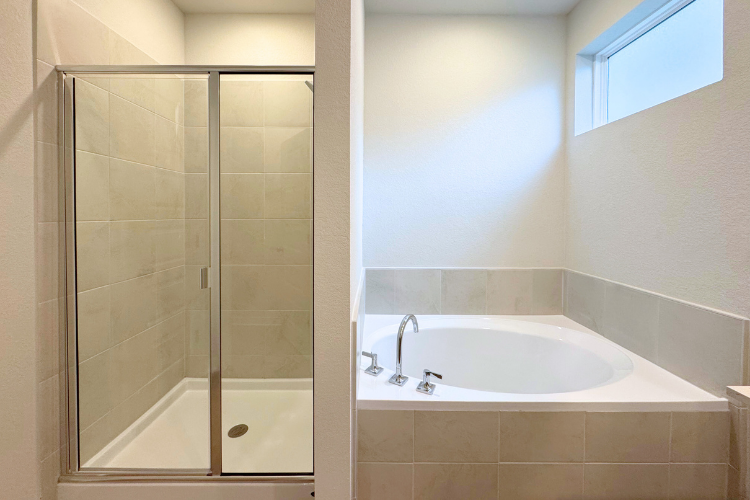 A bathroom with a glass shower.