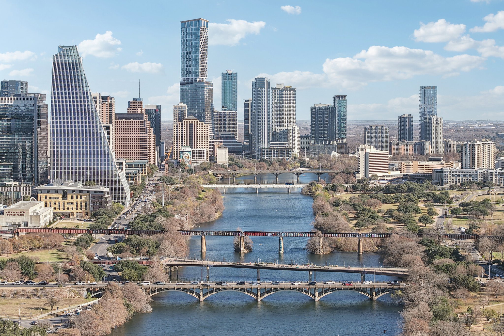 A bridge over a river in a city.