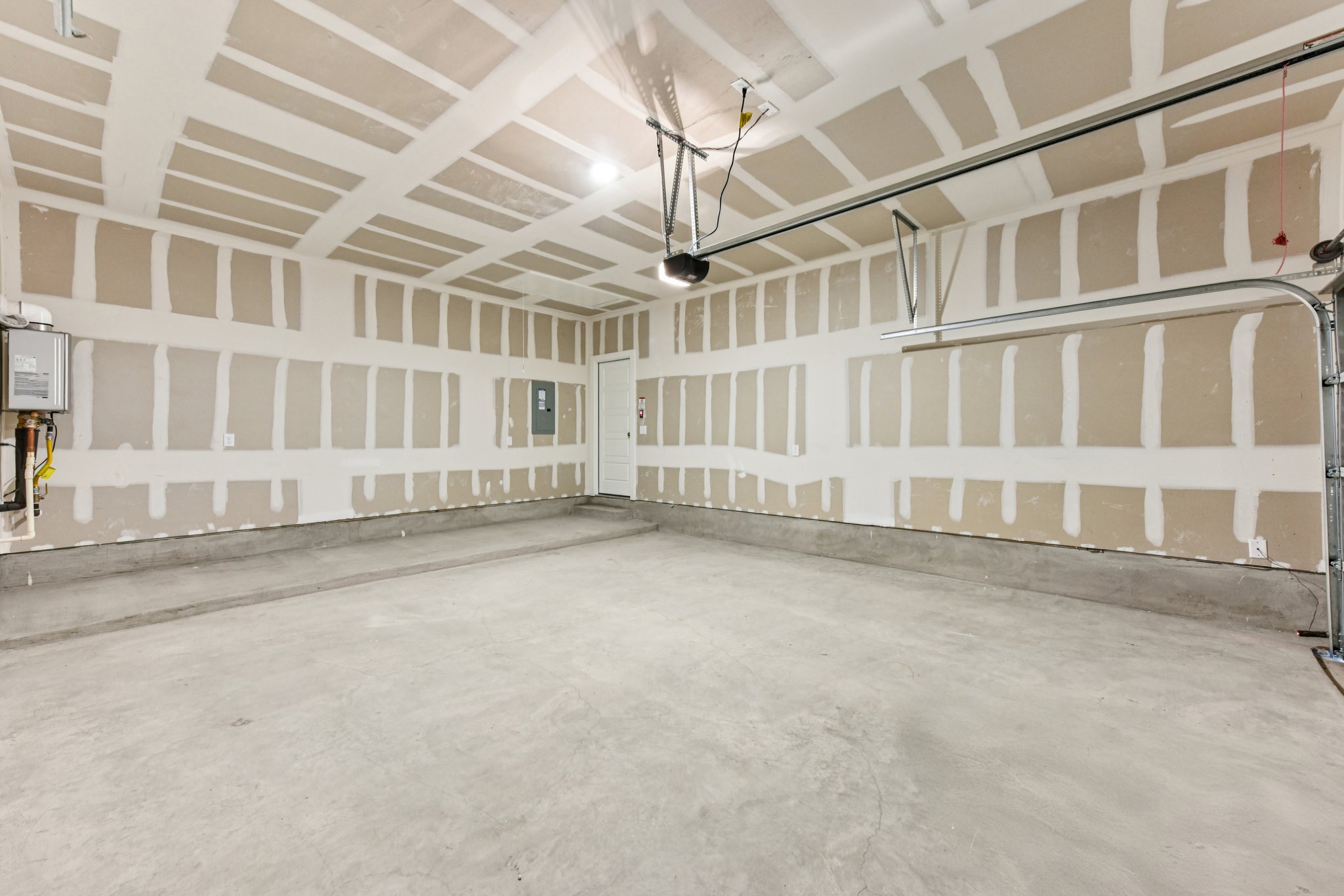 A room with a white wall and a white floor.