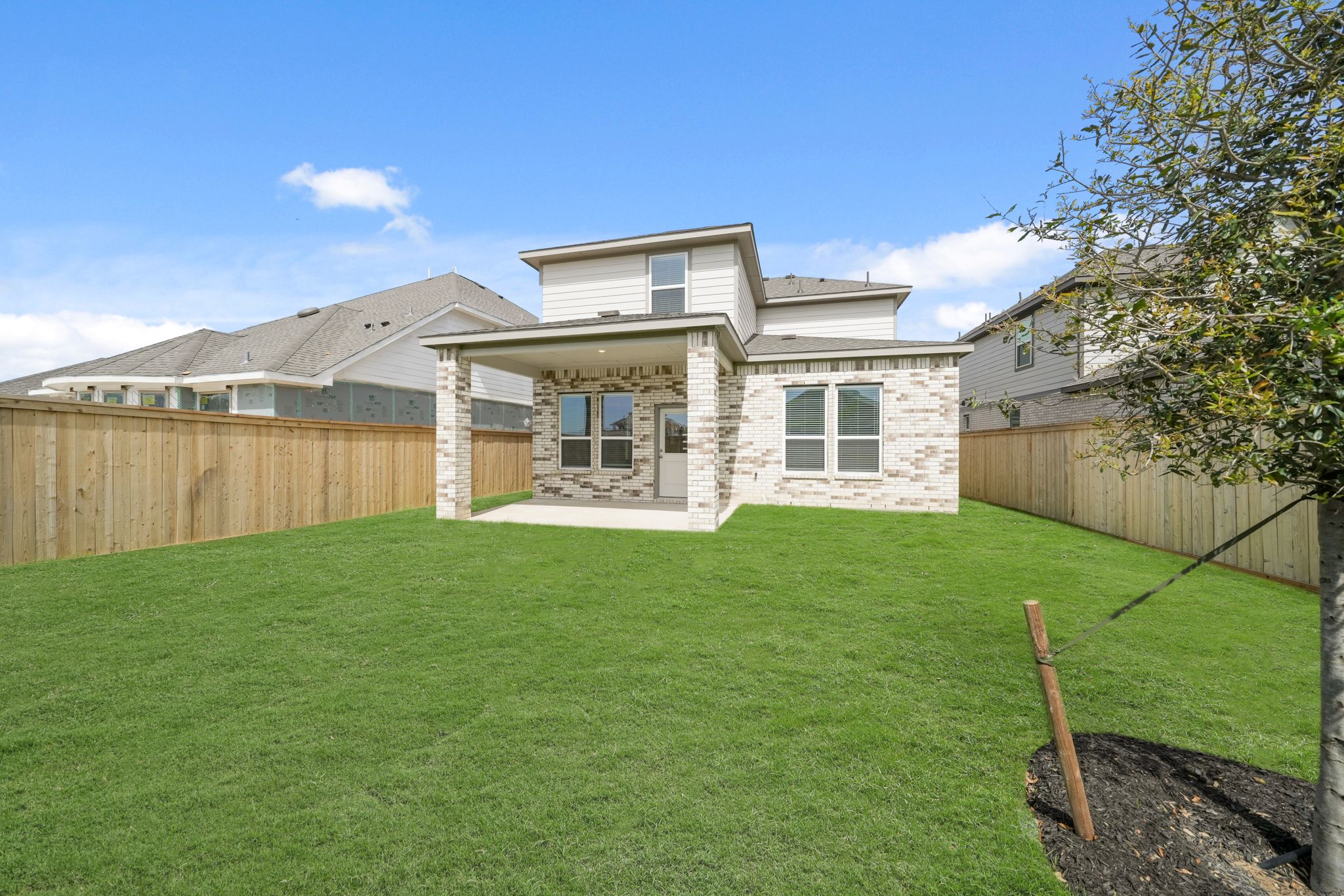 A house with a fence around it.