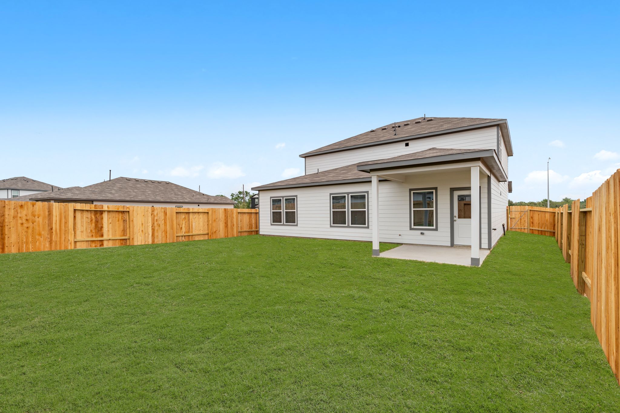 A house with a fence around it.