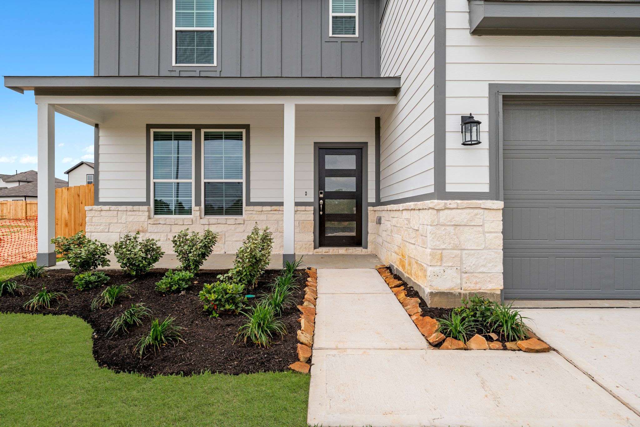 A house with a front yard.