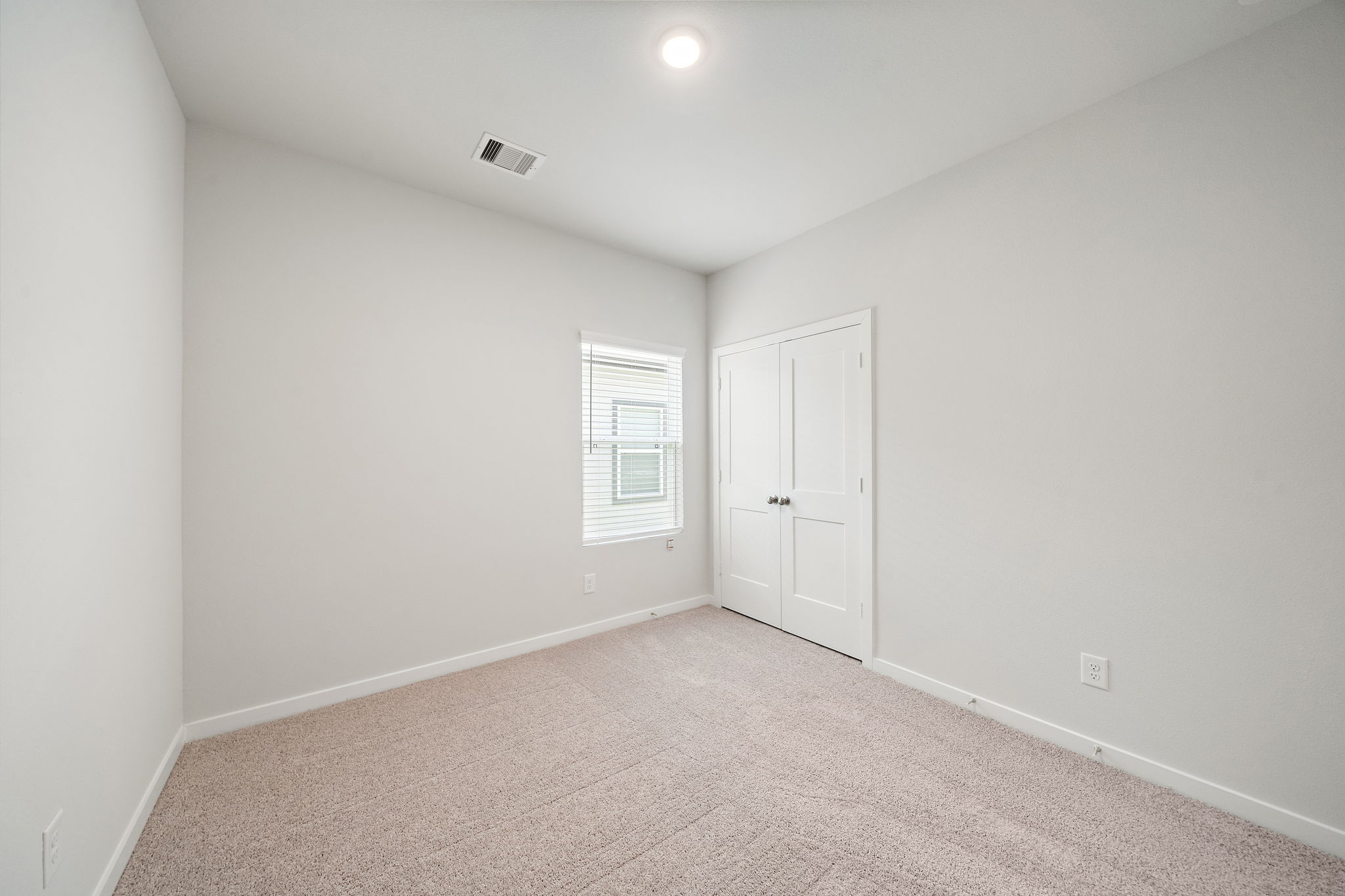 A room with white doors.