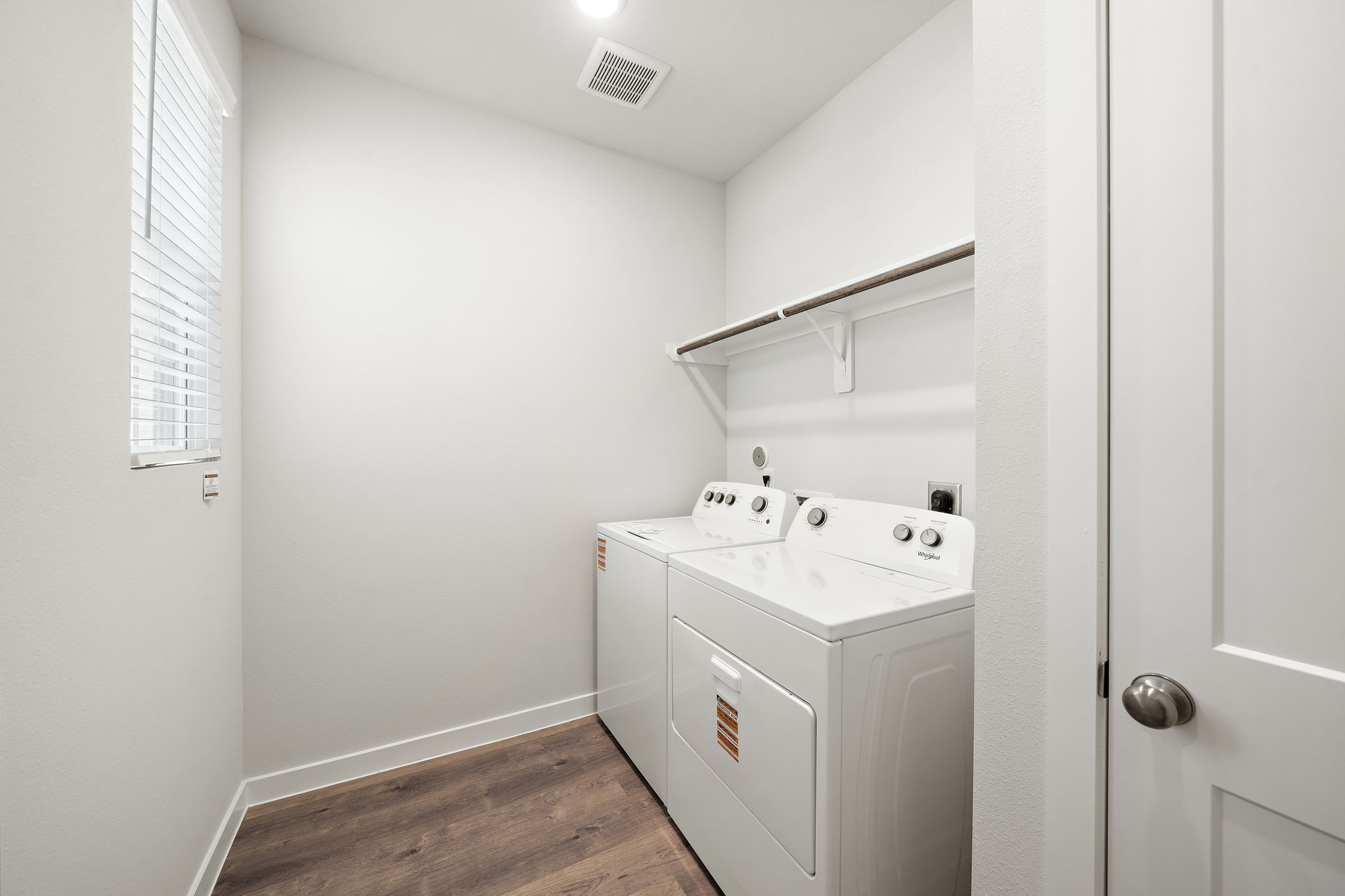 A bathroom with a sink and a cabinet.