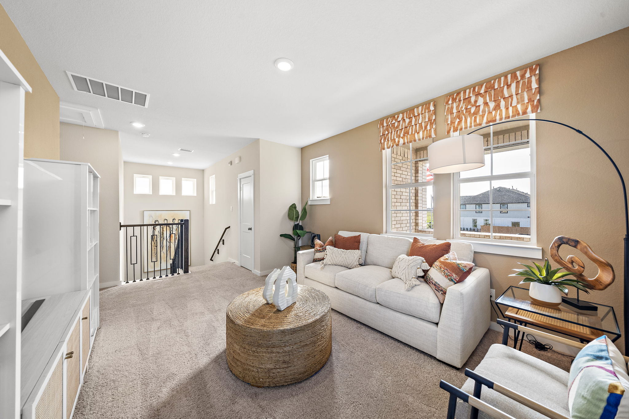 A living room with a large window.