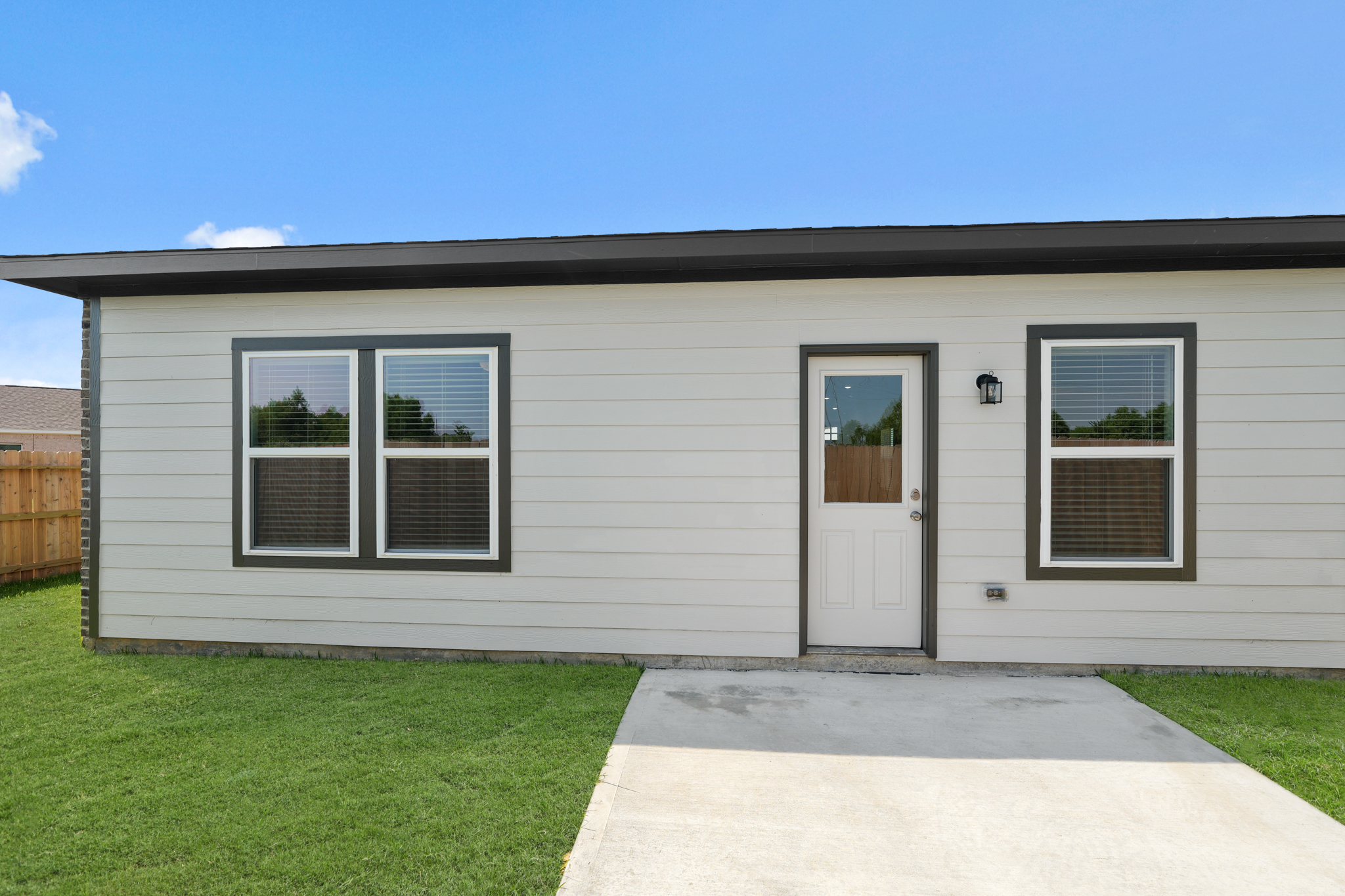 A white house with a door.