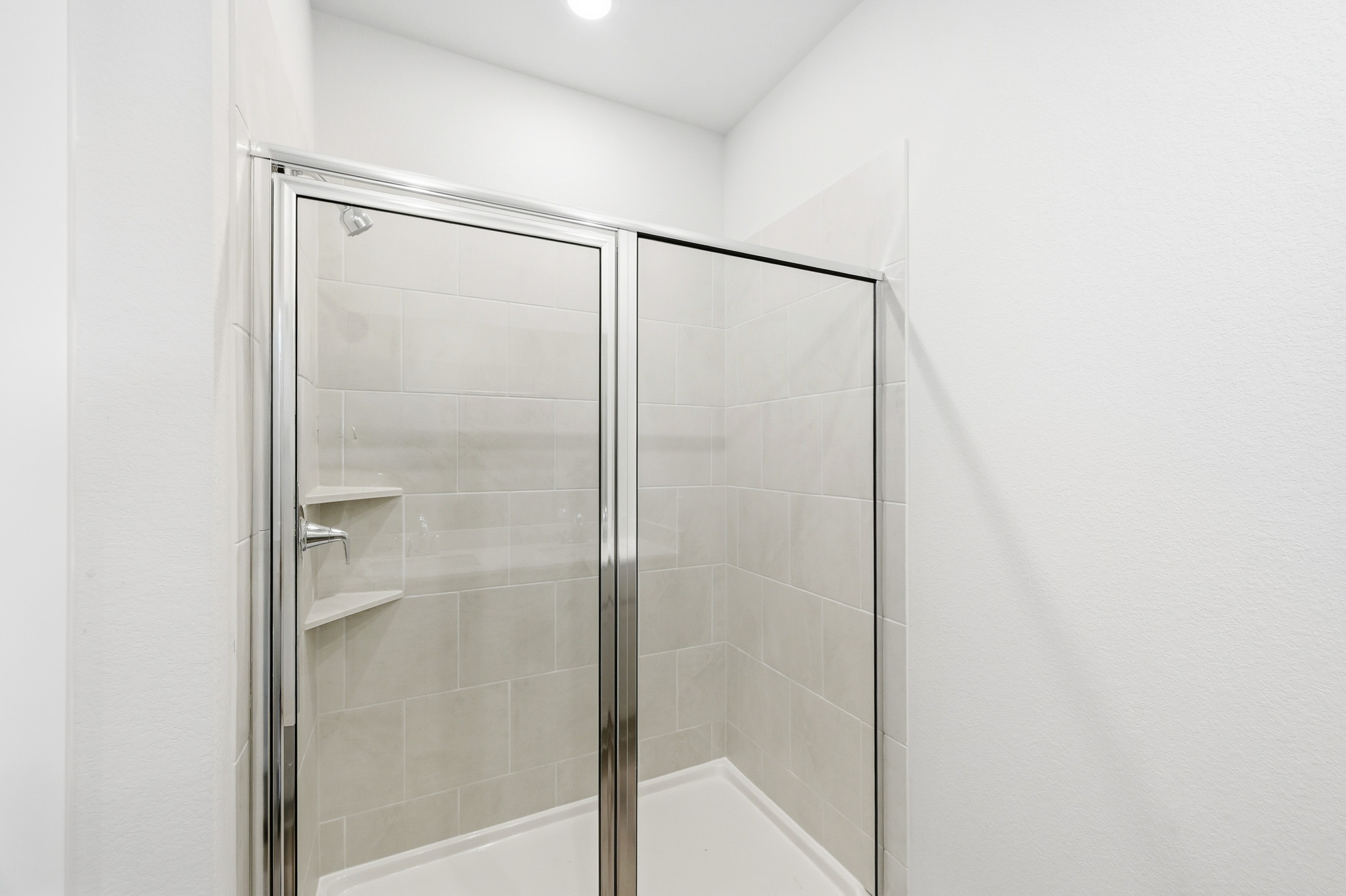 A shower in a bathroom.