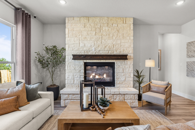 A living room with a fireplace.