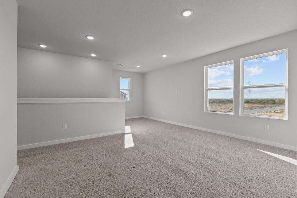 A room with a few windows.