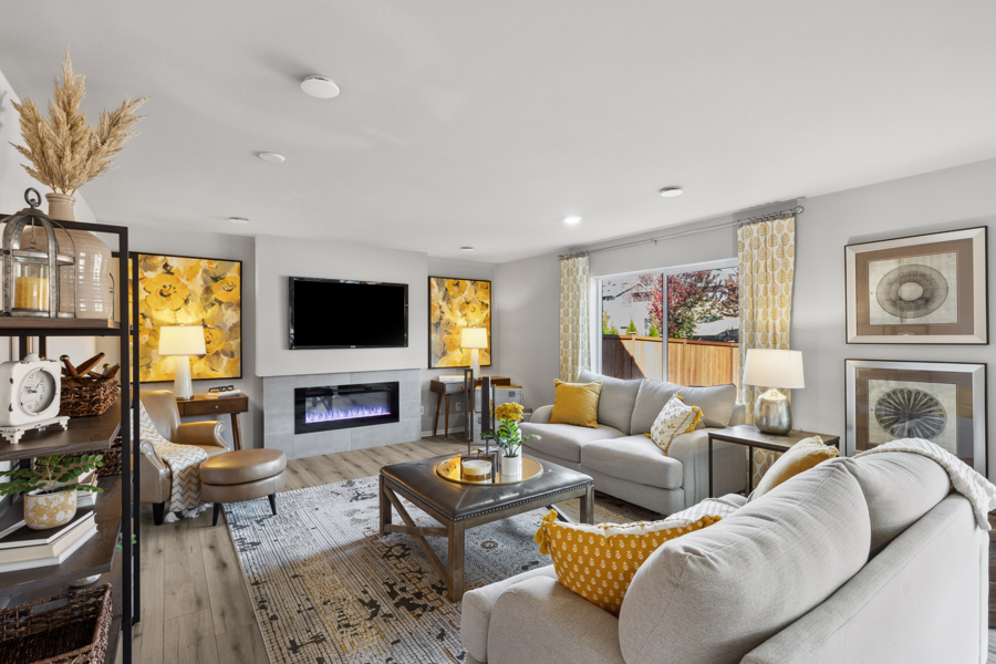 A living room with a fireplace.