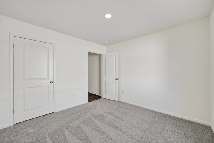 A room with white doors.