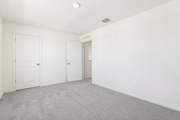 A room with white doors.