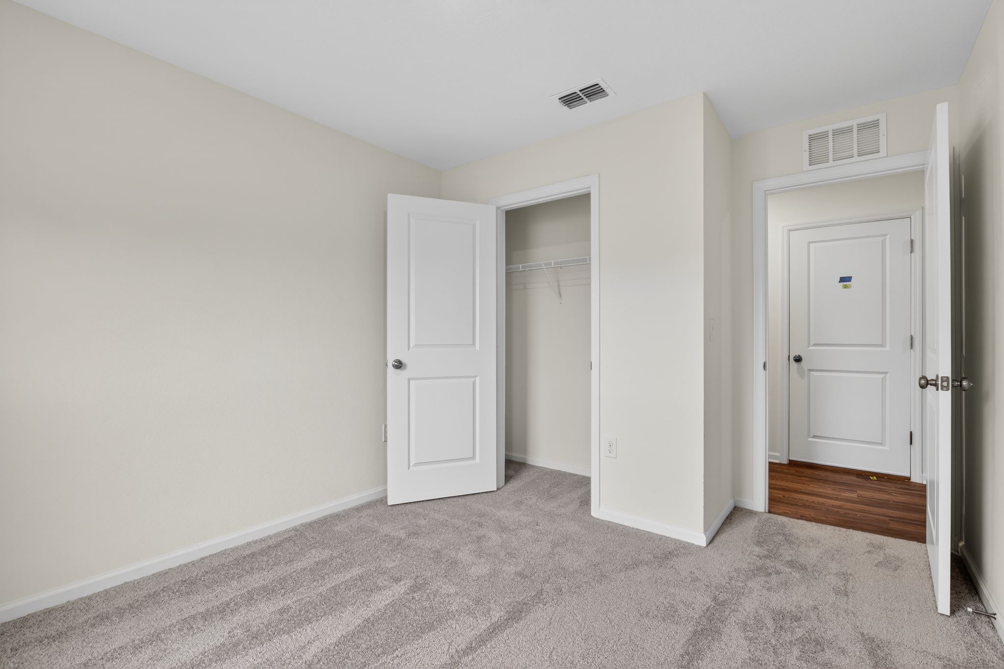 A room with white doors.